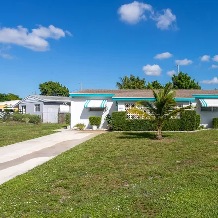 Buy this 3 bed house on 4023 Winchester Lane in Palm Beach County, FL 33406