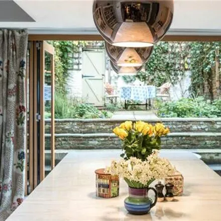 Buy this 4 bed townhouse on Juergen Teller Studio in 296 Latimer Road, London