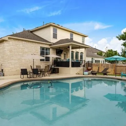 Buy this 4 bed house on 1008 Placid Creek Ct in Round Rock, Texas