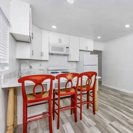 Rent this 3 bed house on Budlong Avenue in Los Angeles, CA 90007