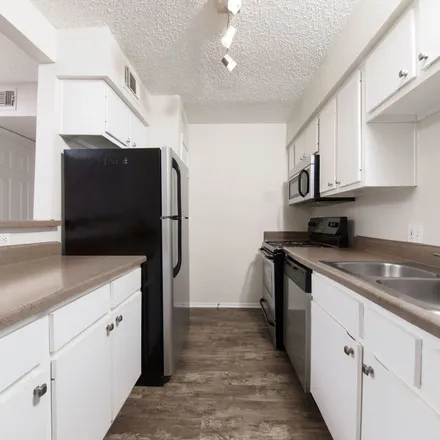 Rent this 3 bed apartment on Building 2 in 1500 East Riverside Drive, Austin