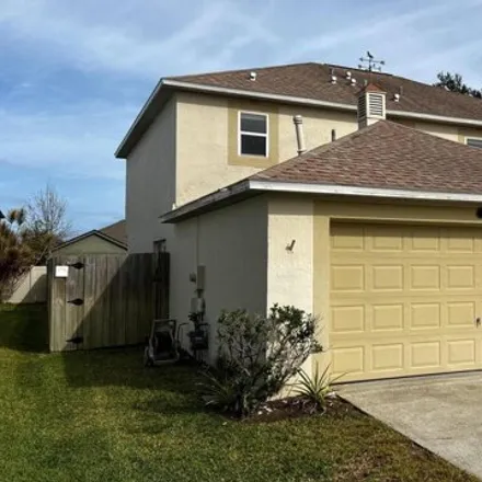 Rent this 4 bed house on 3844 La Flor Drive in Rockledge, FL 32955