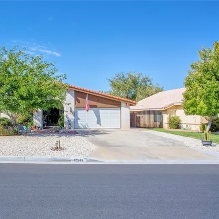 Buy this 3 bed house on Spring Valley Lake Country Club in 13229 Spring Valley Parkway, Victorville