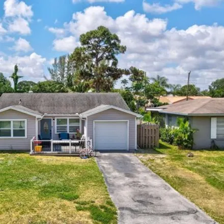 Buy this 3 bed house on 5370 Buchanan Road in County Club Acres, Palm Beach County