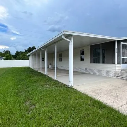 Buy this 2 bed house on 5944 Southwest 60th Place in Marion County, FL 34474