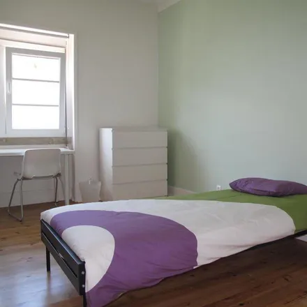 Rent this 4 bed room on Rua de Ponta Delgada 65 in 1000-046 Lisbon, Portugal