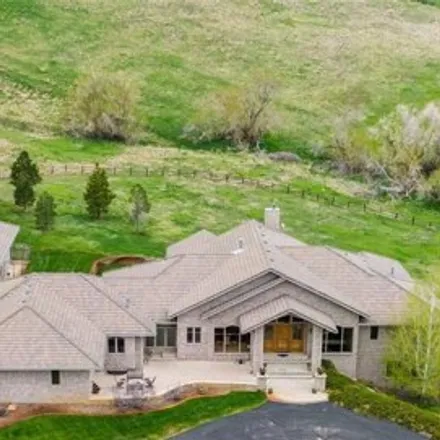 Buy this 7 bed house on 5821 Deer Meadow Trail in Jefferson County, CO 80403