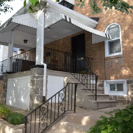 Buy this 2 bed townhouse on 1041 Edgemore Road in Philadelphia, PA 19151