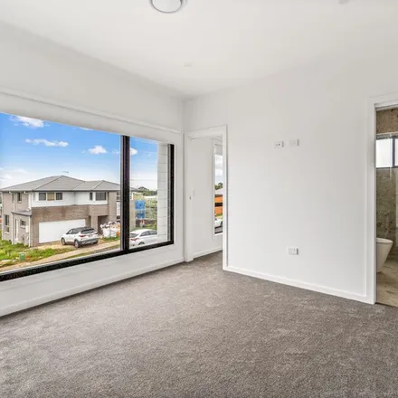 Rent this 4 bed apartment on Celestial Avenue in Dunmore NSW 2529, Australia
