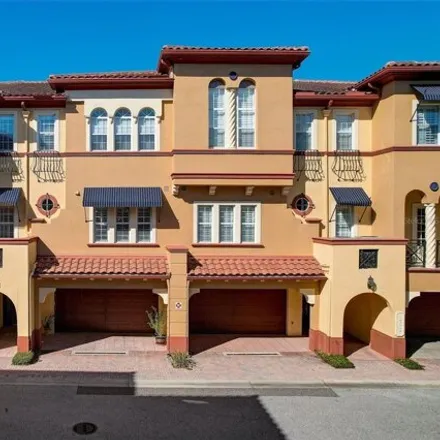 Buy this 4 bed townhouse on 260 Seagatae Court in Dunedin, FL 34698