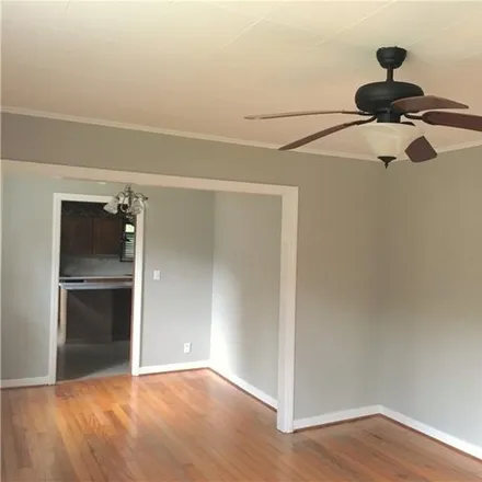 Rent this 3 bed house on 5002 North Hillwood Circle in Country Club Village, Mobile
