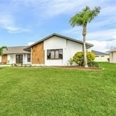 Buy this 3 bed house on 815 Southwest 52nd Street in Cape Coral, FL 33914