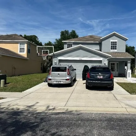 Buy this 5 bed house on 12480 Chenwood Avenue in Pasco County, FL 34669