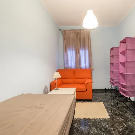 Rent this 4 bed room on Calle de San Emilio in 10, 28017 Madrid