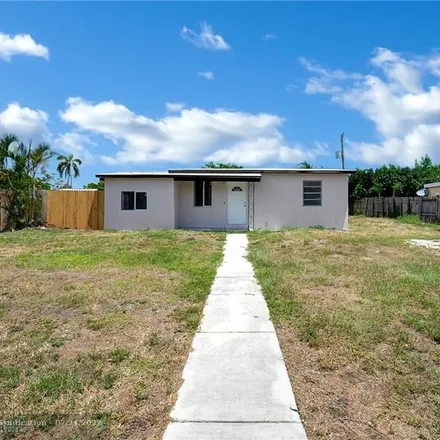 Buy this 3 bed house on 1785 Northeast 49th Court in Pompano Beach, FL 33064