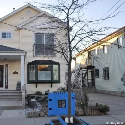 Buy this 4 bed house on 415 Beach 36th Street in New York, NY 11691