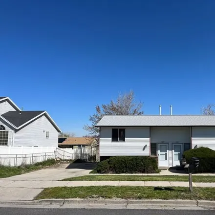 Rent this 2 bed townhouse on 6516 4100 South in West Valley City, UT 84128