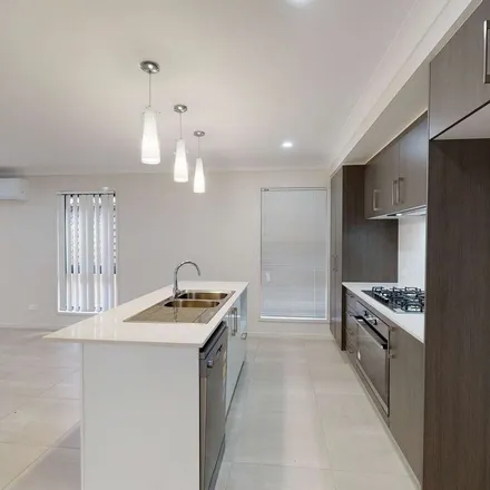 Rent this 4 bed apartment on Silkwood Circuit in Park Ridge QLD 4133, Australia
