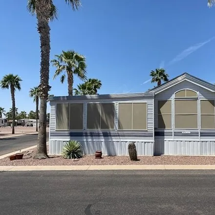 Buy this studio apartment on 1110 N Henness Rd Lot 180 in Casa Grande, Arizona