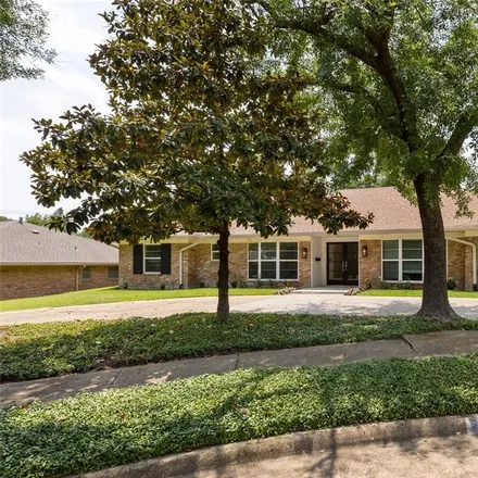 Rent this 4 bed house on 7311 Fieldgate Drive in Dallas, TX 75230