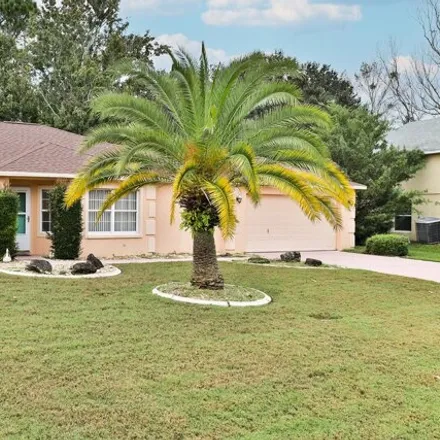 Buy this 3 bed house on 95 Farragut Drive in Palm Coast, FL 32137