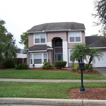 Rent this 4 bed house on 1348 New Town Ave in Orlando, Florida