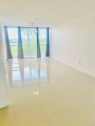 Rent this 2 bed condo on 7075 Northwest 186th Street in Country Club, Miami-Dade County