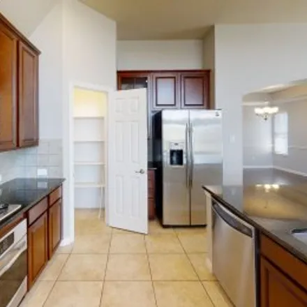 Rent this 3 bed apartment on 1707 Estacado Drive in Villas of Cottonwood Creek, Allen