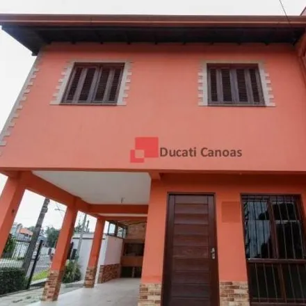 Buy this 3 bed house on Rua Hélio Fraga de Moraes Sarmento in São José, Canoas - RS