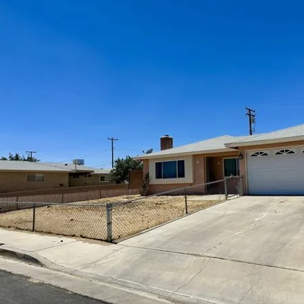 Rent this 4 bed house on 917 Mc Call Street in Ridgecrest, CA 93555
