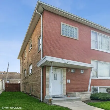 Buy this 6 bed house on 10325 South Rhodes Avenue in Chicago, IL 60628