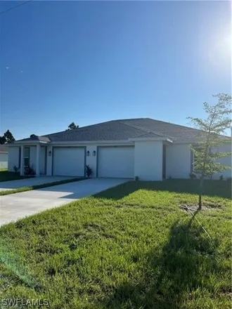 Rent this 3 bed house on 859 Bedford Drive in Lehigh Acres, FL 33974