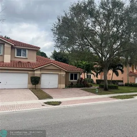 Buy this 3 bed house on 5711 Northwest 125th Avenue in Coral Springs, FL 33076