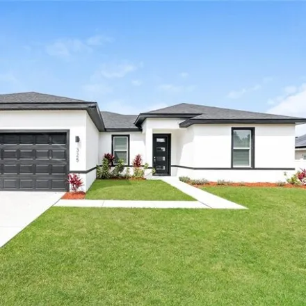 Rent this 4 bed house on 327 Hibiscus Drive in Polk County, FL 34759