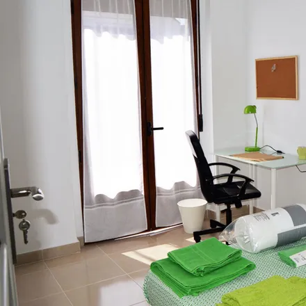 Rent this 4 bed room on Àngel Guimerà in Carrer d'Àngel Guimerà, 46008 Valencia