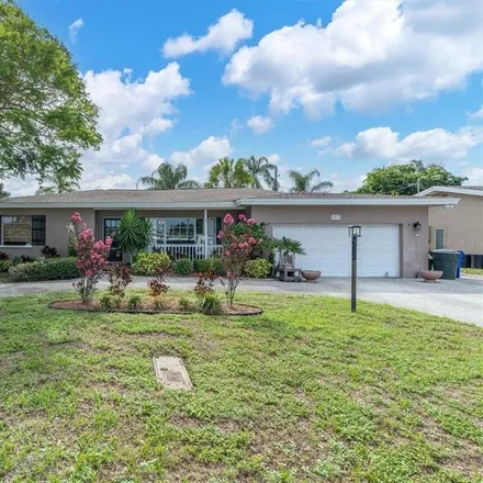 Buy this 2 bed house on 1571 Lakeside Drive in Palm Harbor, FL 34698