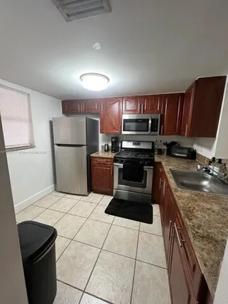 Rent this 1 bed condo on 18051 Nw 68th Ave Apt K103 in Hialeah, Florida
