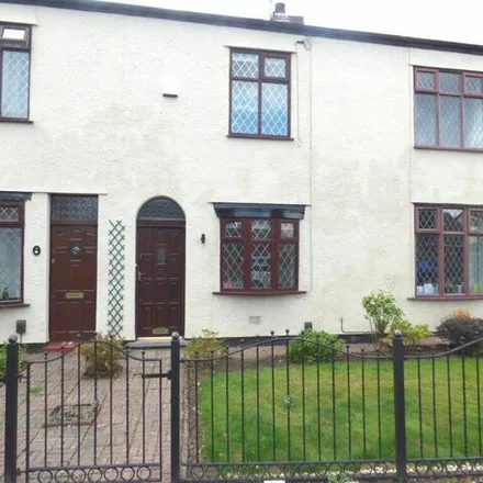 Rent this 2 bed townhouse on Cutnook Lane in Irlam, M44 6JS