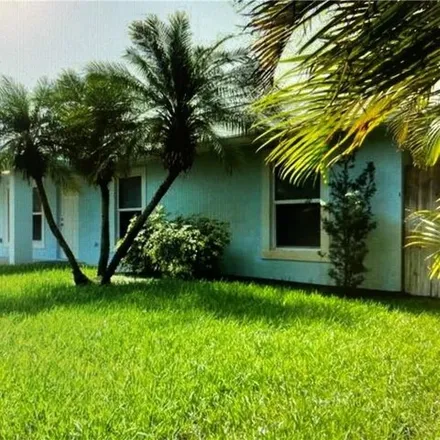 Rent this 3 bed house on 8191 Southeast Evergreen Street in Martin County, FL 33455