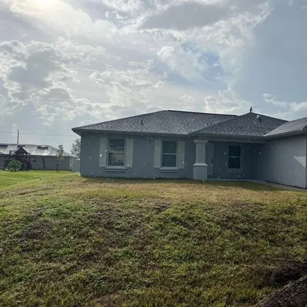Buy this 3 bed house on 1092 Northeast 6th Place in Cape Coral, FL 33909