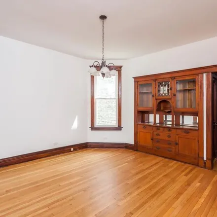 Rent this 3 bed apartment on 1542 West School Street in Chicago, IL 60657