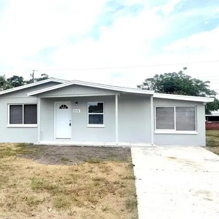 Rent this 4 bed house on 2516 Pepper Avenue in Melbourne, FL 32935