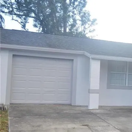 Rent this 3 bed house on 6335 Butte Avenue in Elfers, FL 34653