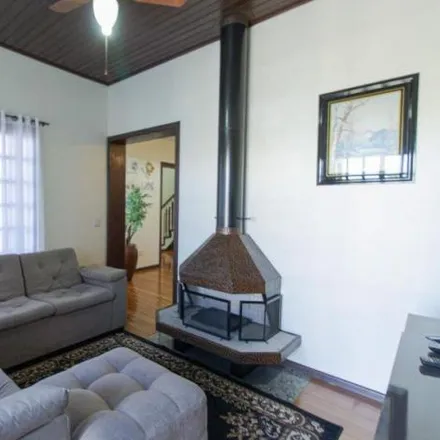 Buy this 4 bed house on Rua Arnaldo Balve in Jardim Itu, Porto Alegre - RS