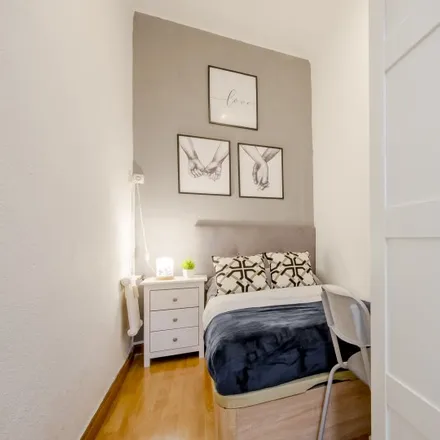 Rent this 6 bed room on Calle de la Aviación Española in 28003 Madrid, Spain