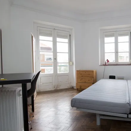 Rent this 7 bed room on Rua José Estevão 29 in 1150-200 Lisbon, Portugal