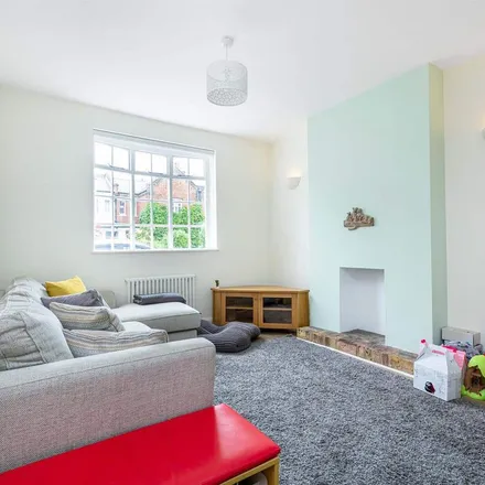 Rent this 2 bed townhouse on 37 Victoria Road in London, SW14 8EX