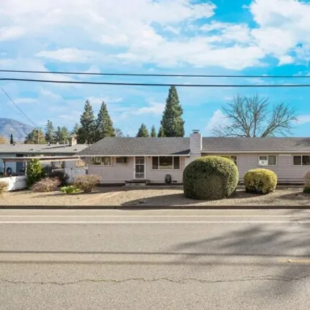 Buy this 4 bed house on 1455 Southwest Bridge Street in Grants Pass, OR 97526