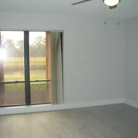 Rent this 2 bed apartment on Southwest Quail Meadow Trail in Palm City, FL 34990