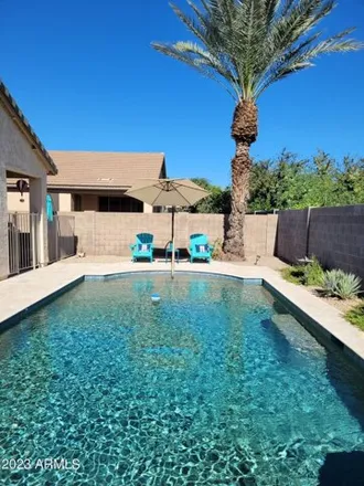 Rent this 4 bed house on 303 North Kimberlee Way in Chandler, AZ 85225